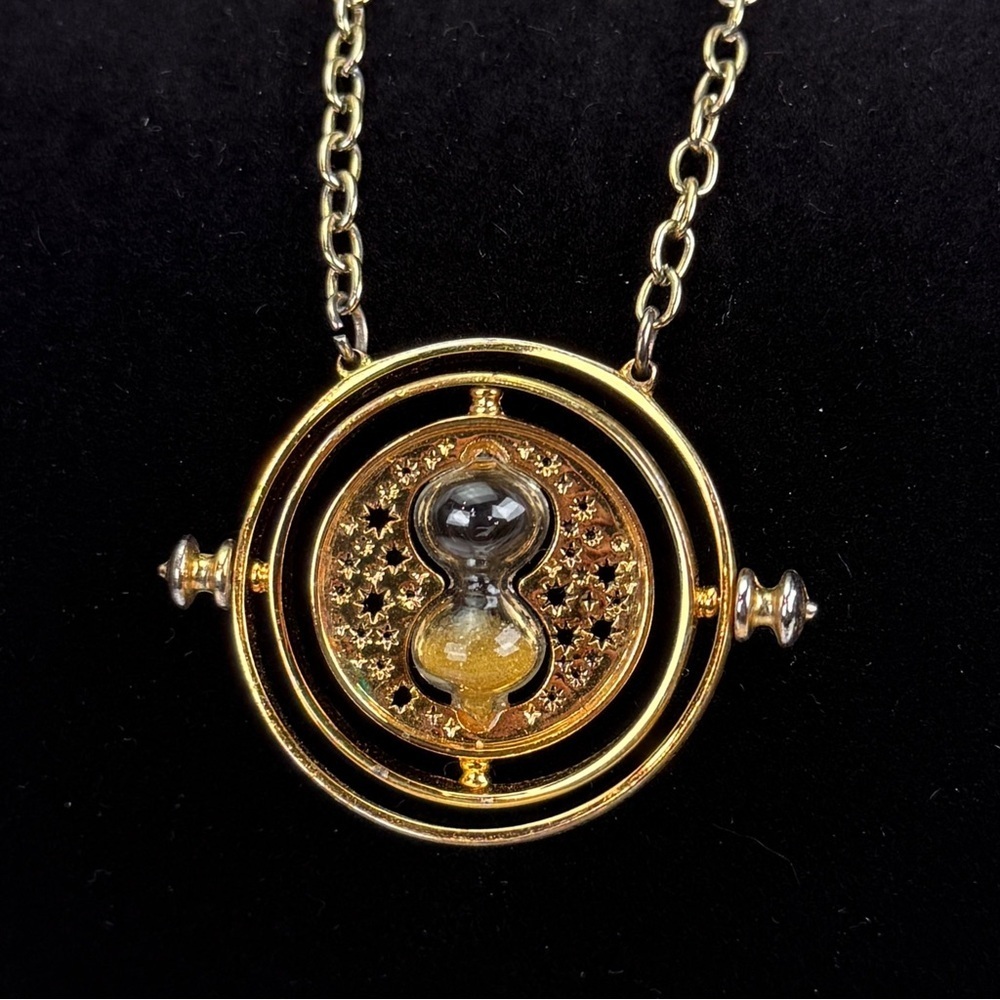 Vintage goldtone, hourglass navigation pendant necklace